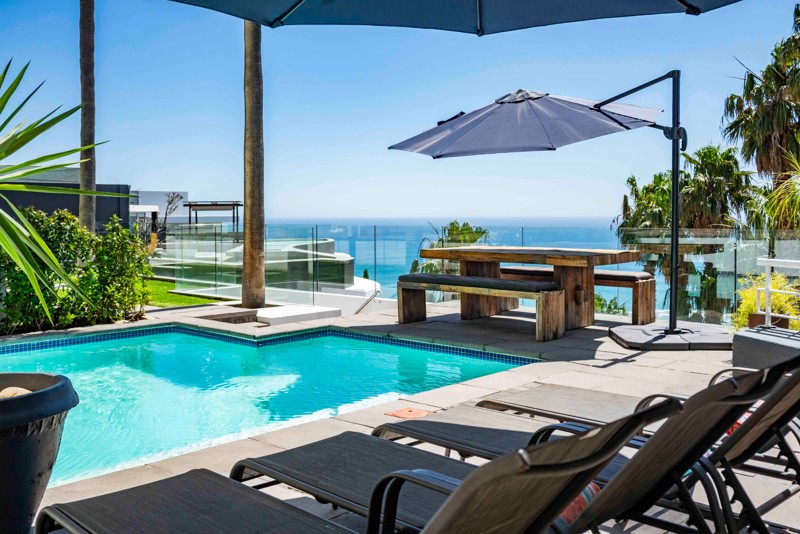 Poolside loungers with the Atlantic on the horizon